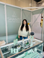 Divya - the founder of Shanti3 skincare brand on an exhibition.